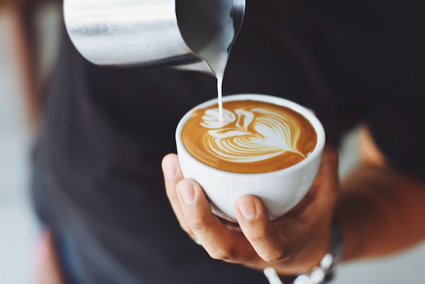 Image of coffee being poured into cup